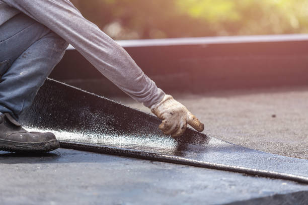 Professional Basement Waterproofing technician working in Buckland, OH
